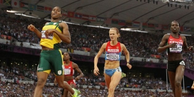 South Africa's silver medalist Caster Semenya (L) competes in the women's 800m final at the athletics event of the London 2012 Olympic Games on August 11, 2012 in London. AFP PHOTO / FRANCK FIFE (Photo credit should read ADRIAN DENNIS/AFP/GettyImages)