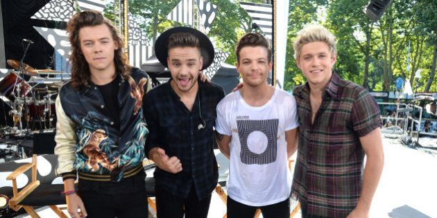 NEW YORK, NY - AUGUST 04: Harry Styles, Liam Payne, Louis Tomlinson and Niall Horan of One Direction pose onstage during ABC's 'Good Morning America' at Rumsey Playfield, Central Park on August 4, 2015 in New York City. (Photo by Kevin Mazur/WireImage)