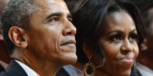 WASHINGTON, DC - DECEMBER 14: (L-R) U.S. President Barack Obama, First Lady Michelle Obama, and Sasha Obama attend TNT Christmas in Washington 2014 at the National Building Museum on December 14, 2014 in Washington, DC. 25248_002_0213.JPG (Photo by Kevin Mazur/WireImage)