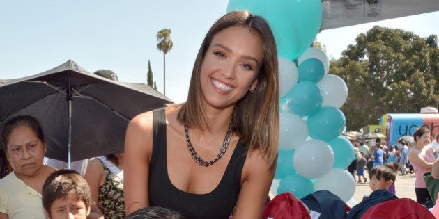 ARLETA, CA - AUGUST 17: The Honest Company's Jessica Alba hands out Honest + STATE Bags with Yoobi supplies to kids entering kindergarten on August 17, 2015 in Arleta, California. (Photo by Charley Gallay/Getty Images for The Honest Company)