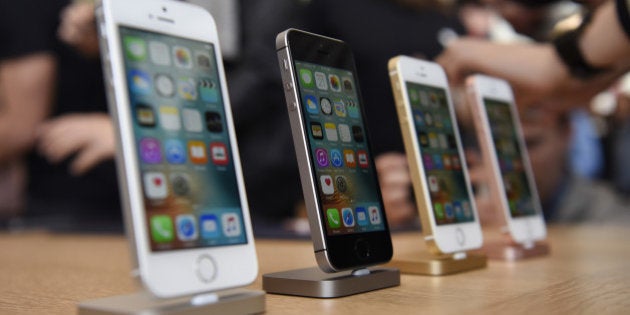 New Apple Inc. iPhone SE smartphones are displayed after an event in Cupertino, California, U.S., on Monday, March 21, 2016. Apple Inc. unveiled a new, smaller iPhone that will start at $399, seeking to jump-start sales of its flagship product by enticing more users to upgrade, especially in high-growth markets such as China and India. Photographer: David Paul Morris/Bloomberg via Getty Images