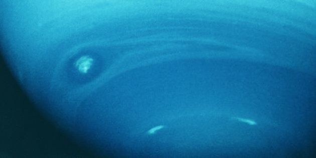 circa 1970: Neptune, fourth largest of the planets in our solar system. The atmosphere consists mostly of hydrogen and helium, but the presence of three per cent methane lends the planet its striking blue hue. (Photo by Hulton Archive/Getty Images)
