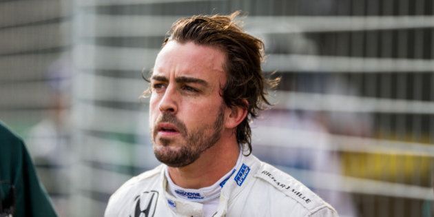 MELBOURNE, AUSTRALIA - MARCH 20: Fernando Alonso of McLaren and Spain immediately after his crash during the Australian Formula One Grand Prix at Albert Park on March 20, 2016 in Melbourne, Australia. (Photo by Peter J Fox/Getty Images)
