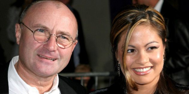 Phil Collins and wife Orianne Cevey during 'Brother Bear' - New York Premiere at New Amsterdam Theatre in New York City, New York, United States. (Photo by James Devaney/WireImage)