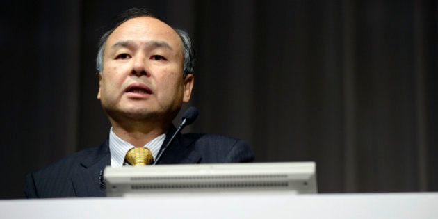 Billionaire Masayoshi Son, chairman and chief executive officer of SoftBank Corp., speaks during a news conference in Tokyo, Japan, on Tuesday, Nov. 4, 2014. SoftBank is forecasting its first profit drop in at least nine years as Sons goal of creating the worlds largest wireless carrier stalls on losses at Sprint Corp. Photographer: Akio Kon/Bloomberg via Getty Images