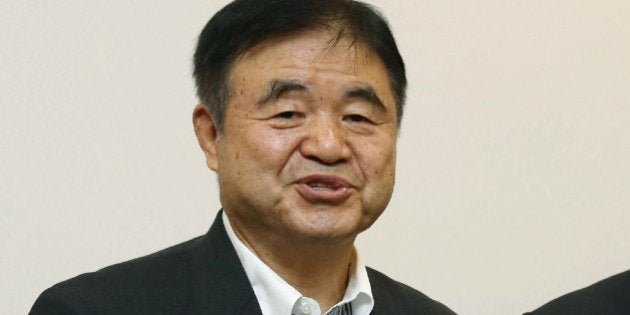 Toshiaki Endo (L), the new cabinet minister in charge of the Tokyo Olympics and Paralympics, and Yoshiro Mori (R), president of the Tokyo 2020 Olympics Organising Committee, speak to the press after a meeting in Tokyo on June 29, 2015. Japan expects the cost of the 2020 Olympic stadium to rise to 252 billion yen (2 billion USD). Construction is set to begin in October with May 2019 the projected completion date -- two months later than initially planned and just in time for the rugby World Cup. AFP PHOTO / JIJI PRESS JAPAN OUT (Photo credit should read JIJI PRESS/AFP/Getty Images)