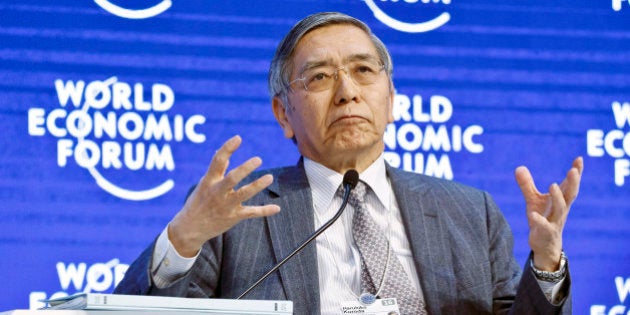 Governor of the Bank of Japan speaks during a panel