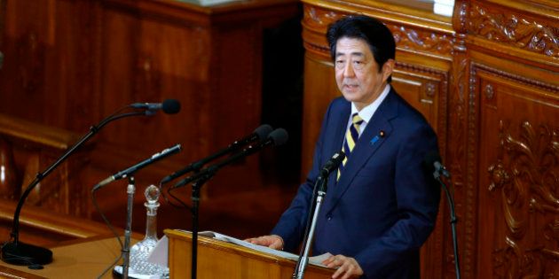Japan's Prime Minister Shinzo Abe speaks during a regular Diet session at the lower house of Parliament in Tokyo, Monday, Jan. 4, 2016. (AP Photo/Shizuo Kambayashi)