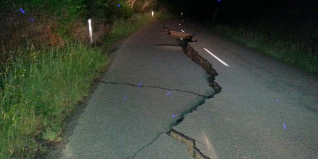 A large fissure runs along Kaikoura Road about two hours north of Christchurch Monday, Nov. 14, 2016, after a major earthquake struck New Zealand's south Island early Monday. The powerful earthquake struck in a mostly rural area close to the city of Christchurch but appeared to be more strongly felt in the capital, Wellington, more than 200 Km (120 miles) away. (AP Photo / Joe Morgan)