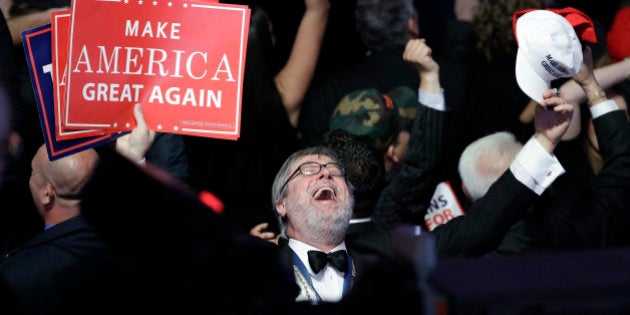 Supporters of Republican presidential candidate Donald Trump react as they watch the election results during Trump's election night rally, Tuesday, Nov. 8, 2016, in New York. (AP Photo/John Locher)