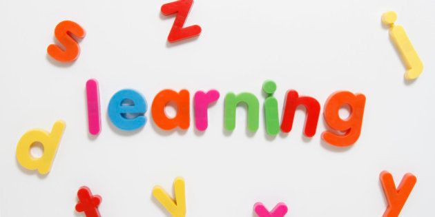 Alphabet fridge magnets spelling 'learning'