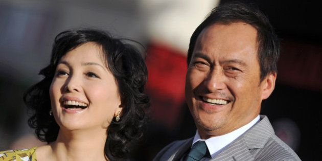 HOLLYWOOD, CA - MAY 08: Actor Ken Watanabe (R) and Kaho Minami arrive at the Los Angeles premiere of 'Godzilla' at Dolby Theatre on May 8, 2014 in Hollywood, California. (Photo by Axelle/Bauer-Griffin/FilmMagic)