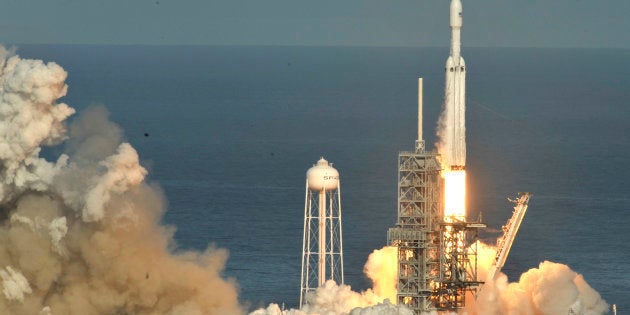 A SpaceX Falcon Heavy rocket lifts off from historic launch pad 39-A at the Kennedy Space Center in Cape Canaveral, Florida, U.S., February 6, 2018. REUTERS/Steve Nesius