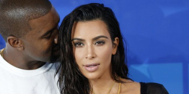 Kim Kardashian and Kanye West arrive at the 2016 MTV Video Music Awards in New York, U.S., August 28, 2016. REUTERS/Eduardo Munoz