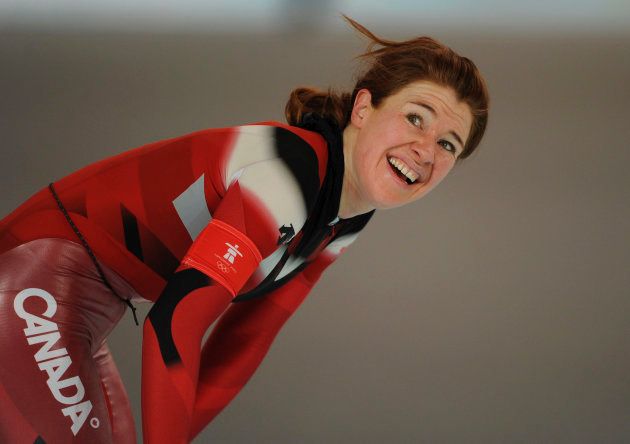 Clara Hughes of Canada smiles after skating in the women's 5,000 metres speed skating race at the Richmond Olympic Oval during the Vancouver 2010 Winter Olympics, February 24, 2010. REUTERS/Dylan Martinez (CANADA)