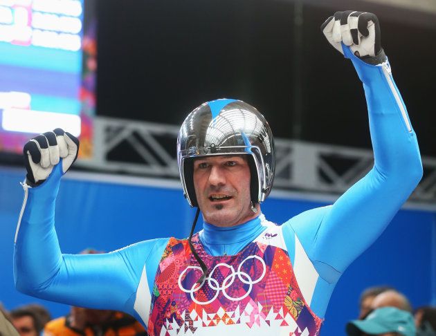 SOCHI, RUSSIA - FEBRUARY 09: Armin Zoeggeler of Italy reacts after competing during the Men's Luge Singles on Day 2 of the Sochi 2014 Winter Olympics at Sliding Center Sanki on February 9, 2014 in Sochi, Russia. (Photo by Alexander Hassenstein/Getty Images)