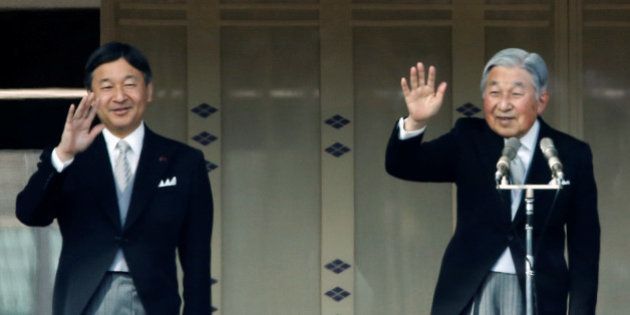 Japanese Emperor Akihito (R) and Crown Prince Naruhito wave to well-wishers during a public appearance for New Year celebrations at the Imperial Palace in Tokyo, Japan, January 2, 2017. REUTERS/Kim Kyung-Hoon