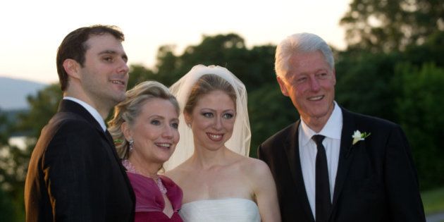 RHINEBECK, NY - JULY 31: In this handout image provided by Barbara Kinney, (L-R) Marc Mezvinsky, U.S. Secretary of State Hillary Clinton, Chelsea Clinton and former U.S. President Bill Clinton pose during the wedding of Chelsea Clinton and Marc Mezvinsky at the Astor Courts Estate on July 31, 2010 in Rhinebeck, New York. Chelsea Clinton, the daughter of former U.S. President Bill Clinton and Secretary of State Hillary Clinton, married Marc Mezvinsky today in an interfaith ceremony at the estate built by John Jacob Astor on the Hudson River about two hours north of New York City. (Photo by Barbara Kinney via Getty Images)