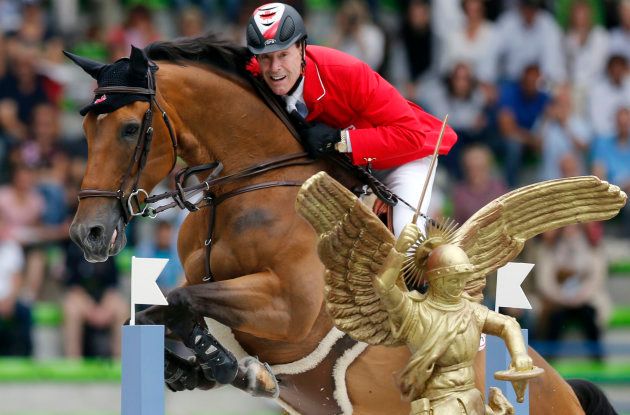 Canada's Ian Millar riding Dixson competes in the jumping first competition during the World Equestrian Games at the d'Ornano stadium in Caen September 2, 2014. REUTERS/Regis Duvignau (FRANCE - Tags: SPORT EQUESTRIANISM)