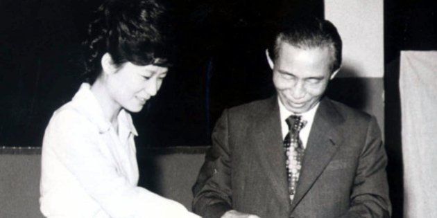 Former South Korean President Park Chung-hee, right, and his daughter Park Geun-hye cast ballots in Seoul, South Korea, in this 1977 photo. Park Geun-Hye, now one of 16 female legislators in the 273-member National Assembly, has embarked on a successful political career, motivated by a desire to rebuild the reputation of the country's most controversial president. (AP Photo/Yonhap)