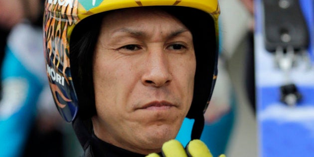 Japan's NoriakiÂ Kasai prepares for his trial jump of the third stage at the third stage of the four hills ski jumping tournament in Innsbruck, Austria, Saturday, Jan. 3, 2015. (AP Photo/Matthias Schrader)