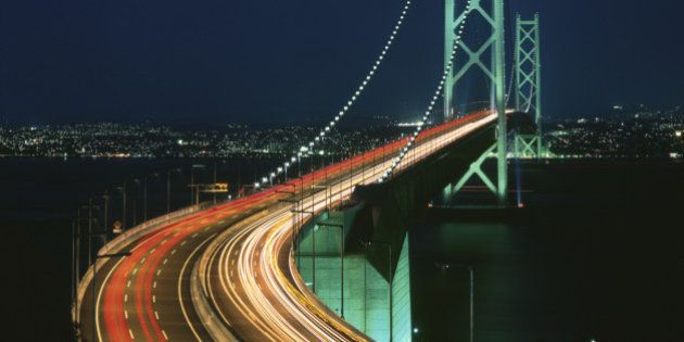Japan, Hyogo Prefecture, Akashi, Awaji Island, Akashi Kaikyo Bridge, Bridge lit up at night