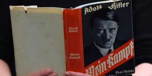 A German edition of Adolf Hitler's 'Mein Kampf' (My Struggle) is pictured at the Berlin Central and Regional Library (Zentrale Landesbibliothek, ZLB) in Berlin on December 7, 2015. For the first time since World War II, Adolf Hitler's 'Mein Kampf' will be printed in Germany in January 2016 as an annotated edition published by the Institute of Contemporary History (IFZ) in Munich. AFP PHOTO / TOBIAS SCHWARZ / AFP / TOBIAS SCHWARZ (Photo credit should read TOBIAS SCHWARZ/AFP/Getty Images)