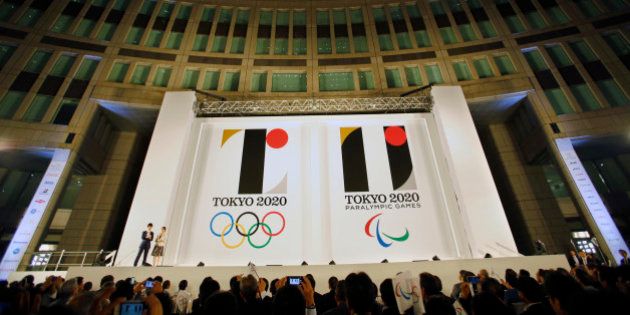 The official emblems of the Tokyo 2020 Olympics and Paralympic Games, is unveiled at Tokyo Metropolitan Plaza in Tokyo, Friday, July 24, 2015. (AP Photo/Shizuo Kambayashi)