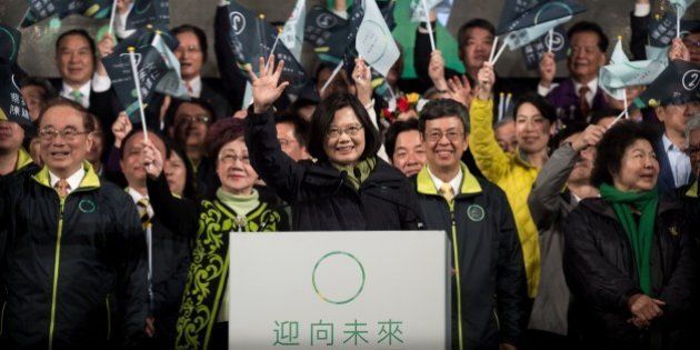Democratic Progressive Party (DPP) presidential candidate Tsai Ing-wen (C) celebrates her victory inTaipei on January 15, 2016. Voters in Taiwan elected a Beijing-sceptic president in a dramatic democratic journey, carving their own political path against China's wishes. AFP PHOTO / Philippe Lopez / AFP / PHILIPPE LOPEZ (Photo credit should read PHILIPPE LOPEZ/AFP/Getty Images)