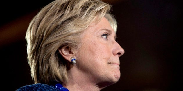 Democratic presidential candidate Hillary Clinton pauses while speaking at a rally at Theodore Roosevelt High School in Des Moines, Iowa, Friday, Oct. 28, 2016. (AP Photo/Andrew Harnik)