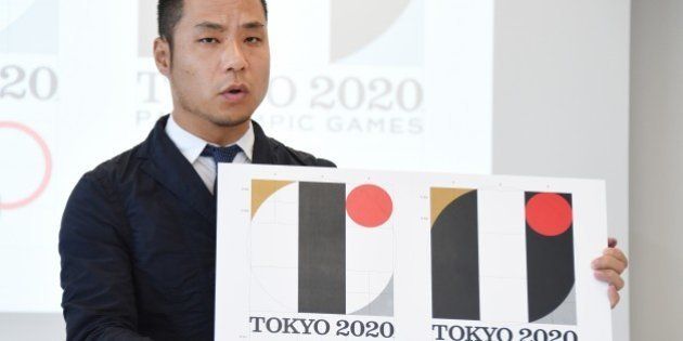 Tokyo Olympic logo designer Kenjiro Sano explains his design during a press conference at the headquarters of Tokyo 2020 in Tokyo on August 5, 2015. Sano denied plagiarism claims after his emblem triggered threats of possible legal action in Europe. AFP PHOTO / Toru YAMANAKA (Photo credit should read TORU YAMANAKA/AFP/Getty Images)