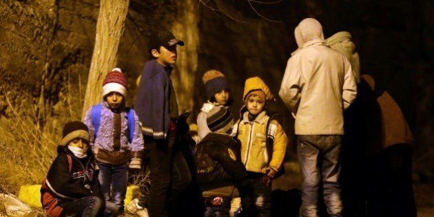 Syrian children wait on the outskirts of the besieged rebel-held Syrian town of Madaya, on January 11, 2016, after being evacuated from the town.Dozens of aid trucks headed to Madaya, where more than two dozen people are reported to have starved to death, after an outpouring of international concern and condemnation over the dire conditions in the town, where some 42,000 people are living under a government siege. / AFP / LOUAI BESHARA (Photo credit should read LOUAI BESHARA/AFP/Getty Images)