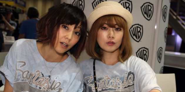 SAN DIEGO, CA - JULY 27: In this handout photo provided by Warner Bros, Ami Kobashi and Yumi Yoshimura of Puffy AmiYumi special guests of 'Teen Titans Go!' attend Comic-Con International 2014 on July 27, 2014 in San Diego, California. (Photo by Chris Frawley/Warner Bros. Entertainment Inc. via Getty Images)