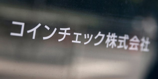 Cryptocurrency exchange Coincheck's signboard is pictured in front of a building where their office is located, in Tokyo, Japan January 29, 2018. REUTERS/Kim Kyung-Hoon