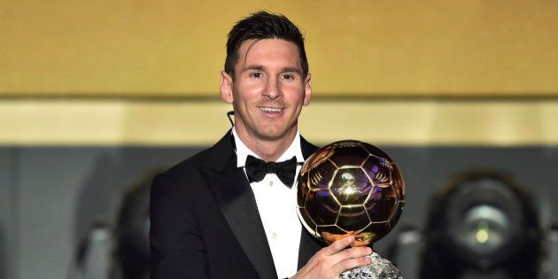 TOPSHOT - FC Barcelona and Argentina's forward Lionel Messi poses with trophy after receiving the 2015 FIFA Ballon dOr award for player of the year during the 2015 FIFA Ballon d'Or award ceremony at the Kongresshaus in Zurich on January 11, 2016. AFP PHOTO / FABRICE COFFRINI / AFP / FABRICE COFFRINI (Photo credit should read FABRICE COFFRINI/AFP/Getty Images)