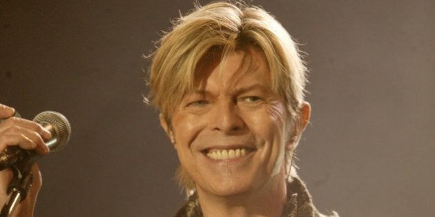 NEWPORT, UNITED KINGDOM - JUNE 13: Singer David Bowie performs on stage on the third and final day of 'The Nokia Isle of Wight Festival 2004' at Seaclose Park on June 13, 2004 in Newport, Isle of Wight, UK. The third annual rock festival takes place during the Isle of Wight Festival which runs from June 4-19. (Photo by Dave Hogan/Getty Images)