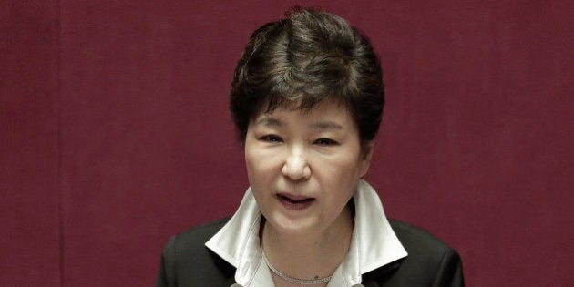 South Korean President Park Geun-hye delivers a speech at the National Assembly in Seoul, South Korea, Monday, Oct. 24, 2016. Park proposed revising the country's Constitution to change the current single five-year presidential system. Critics quickly criticized Park's overture, saying it appears aimed at diverting public attention away from a snowballing corruption scandal involving a purported longtime confidant of hers. (AP Photo/Ahn Young-joon)