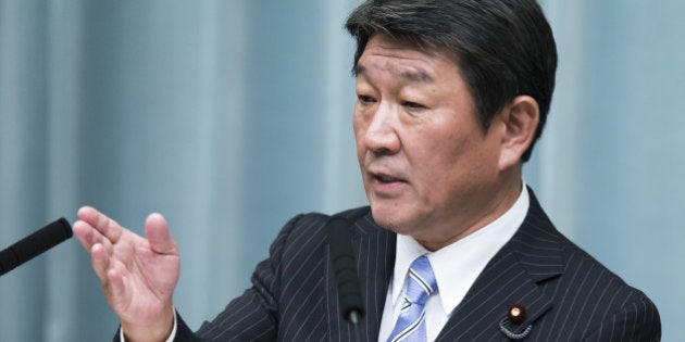 Toshimitsu Motegi, newly-appointed economic revitalization minister of Japan, speaks during a news conference at the Prime Minister's official residence in Tokyo, Japan, on Thursday, Aug. 3, 2017. Japanese Prime Minister Shinzo Abe reshuffled his ministers and party officials after a slump in popularity and a humiliating local election defeat. Photographer: Tomohiro Ohsumi/Bloomberg via Getty Images