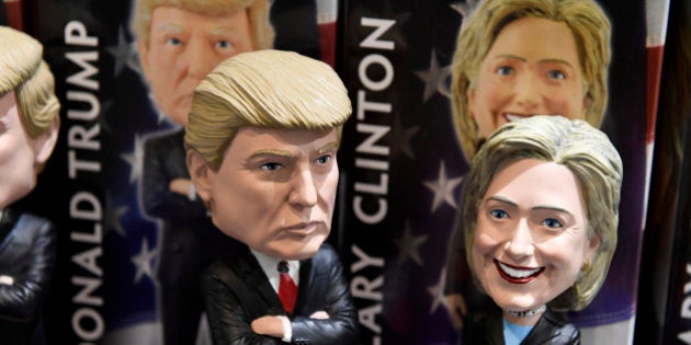 Bobblehead dolls of US Republican presidential nominee Donald Trump and Democratic presidential nominee Hillary Clinton are seen for sale in a gift shop at Philadelphia International Airport, October 20, 2016 in Philadelphia, Pennsylvania. / AFP / Robyn Beck (Photo credit should read ROBYN BECK/AFP/Getty Images)