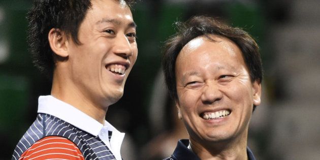 TOKYO, JAPAN - NOVEMBER 22: (L-R) Kei Nishikori and coach Michael Chang attend the Dream Tennis exhibition match at Ariake Colosseum on November 22, 2014 in Tokyo, Japan. (Photo by Jun Sato/Getty Images)