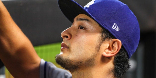 FLUSHING, NY - AUGUST 04: Los Angeles Dodgers starting pitcher Yu Darvish (21) in the dugoiut between innings during the Major League Baseball game between the New York Mets and the Los Angeles Dodgers on August 04, 2017 at Citi Field in Flushing, NY. (Photo by Rich Graessle/Icon Sportswire via Getty Images)