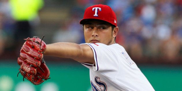 Jul 26, 2017; Arlington, TX, USA; Texas Rangers starting pitcher Yu Darvish (11) throws a pitch in the first inning against the Miami Marlins at Globe Life Park in Arlington. Mandatory Credit: Tim Heitman-USA TODAY Sports