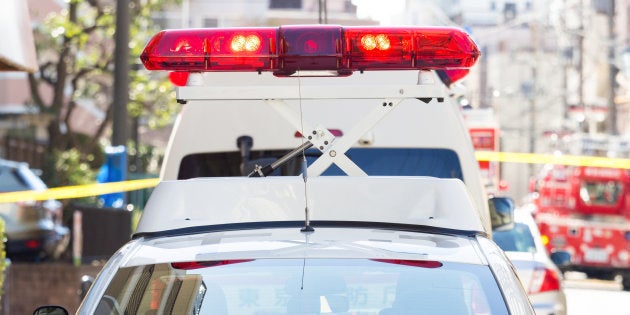 Police car waiting at the fire site