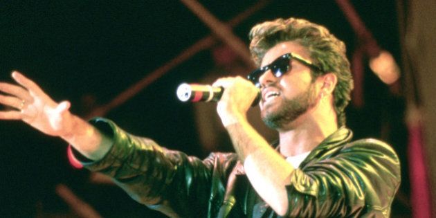 George Michael and Wham performing live at the Live Aid Concert, Wembley Stadium, London on 13th July 1985.; (Photo by Steve Rapport/Photoshot/Getty Images)