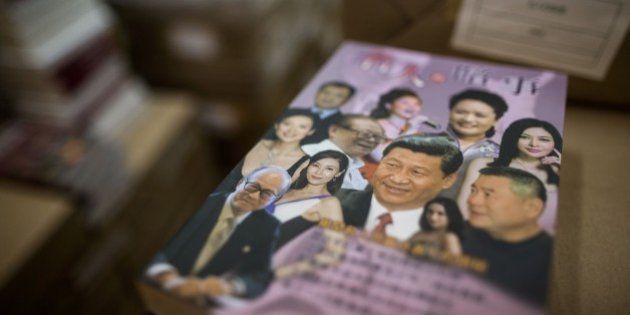 A book with Chinese President Xi Jinping (C on book) is displayed at the warehouse of Hong Kong-based publisher Mighty Current in Hong Kong on January 2, 2016. A missing Hong Kong employee from a publisher of books critical of China was 'assisting in an investigation', his wife said on January 2, as the city's deputy leader sought to reassure residents over their safety. AFP PHOTO / ANTHONY WALLACE / AFP / ANTHONY WALLACE (Photo credit should read ANTHONY WALLACE/AFP/Getty Images)