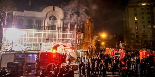 Iranian protesters set fire to the Saudi Embassy in Tehran during a demonstration against the execution of prominent Shiite Muslim cleric Nimr al-Nimr by Saudi authorities, on January 2, 2016. Nimr was a driving force of the protests that broke out in 2011 in Saudi Arabia's east, an oil-rich region where the Shiite minority of an estimated two million people complains of marginalisation. AFP PHOTO / ISNA / MOHAMMADREZA NADIMI / AFP / ISNA / MOHAMMADREZA NADIMI (Photo credit should read MOHAMMADREZA NADIMI/AFP/Getty Images)