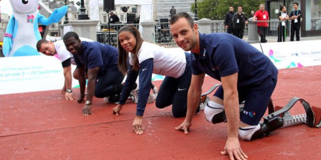 LONDON, ENGLAND - SEPTEMBER 8: (R-L) Oscar Pistorius, April Holmes, Jerome Singleton and Heinrich Popow line up during the International Paralympic Day at Trafalgar Square on September 8, 2011 in London, England. The day marks the start of Paralympic tickets going on sale on September 9, 2011. (Photo by Jan Kruger/Getty Images)