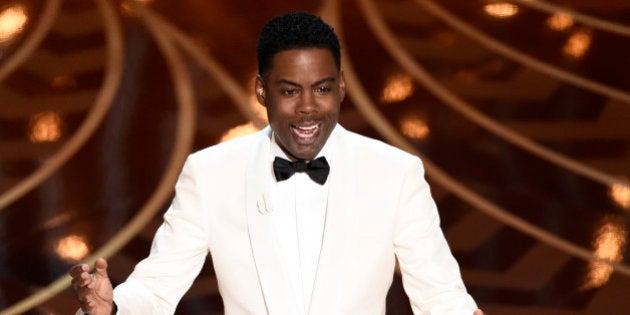 Host Chris Rock speaks at the Oscars on Sunday, Feb. 28, 2016, at the Dolby Theatre in Los Angeles. (Photo by Chris Pizzello/Invision/AP)