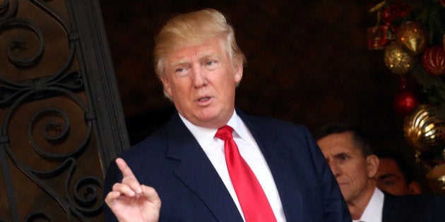 U.S. President-elect Donald Trump talks to members of the media at Mar-a-Lago estate in Palm Beach, Florida, U.S., December 21, 2016. REUTERS/Carlos Barria