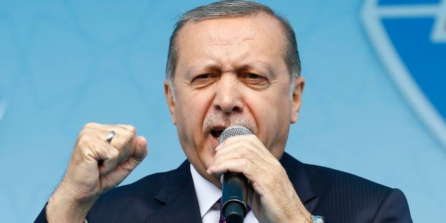 Turkish President Tayyip Erdogan addresses his supporters during a rally for the upcoming referendum in Konya, Turkey, April 14, 2017. REUTERS/Umit Bektas TPX IMAGES OF THE DAY